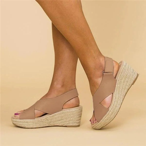 Black women's orthopedic wedge sandals with a cushioned footbed and adjustable straps.