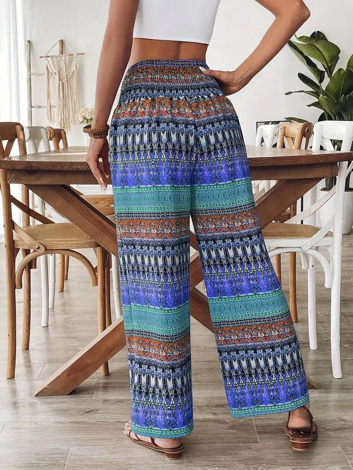 Women's Lyra boho print wide leg pants with a colorful multicolor design and drawstring waist.