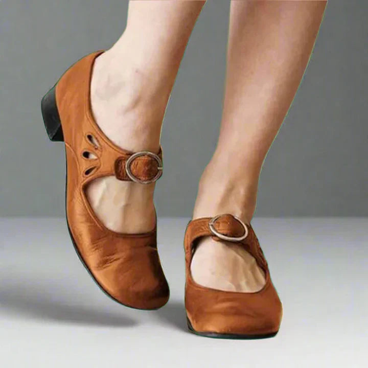 Reddish brown leather wedge sandals with buckle strap, orthopedic design for women.