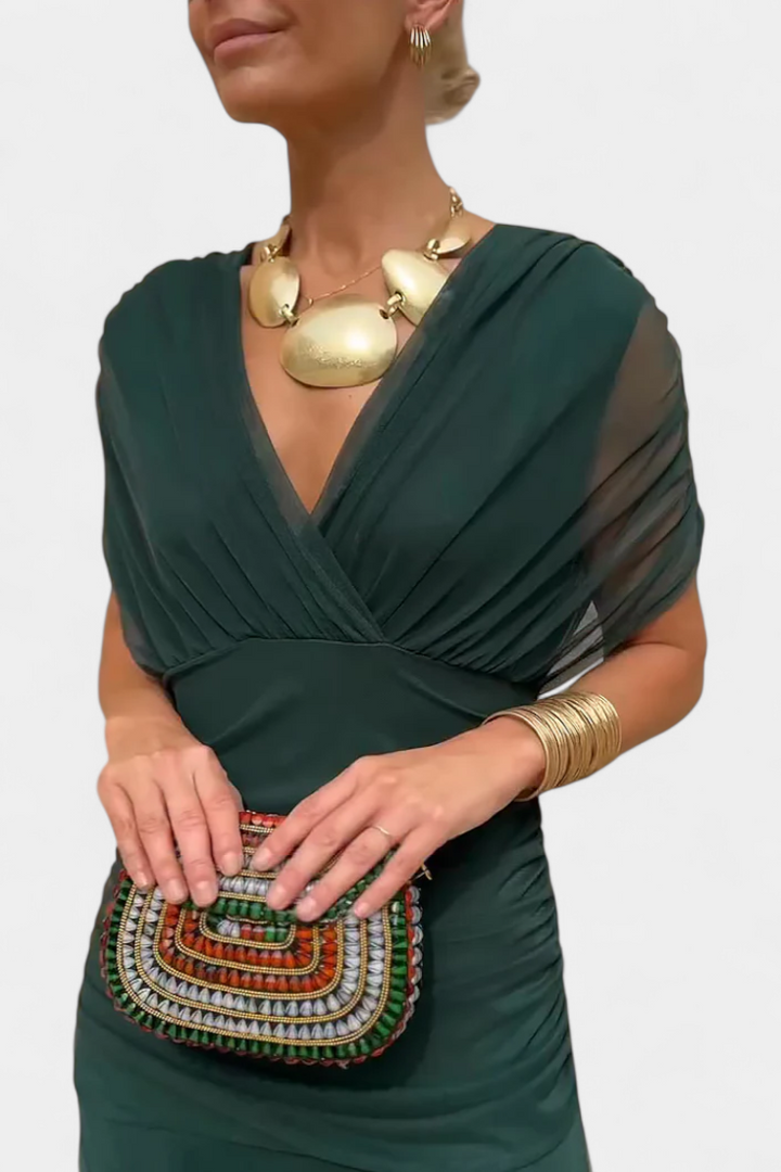 Green Marielle off-shoulder ruched maxi dress with sheer sleeves, elegant and flowing.