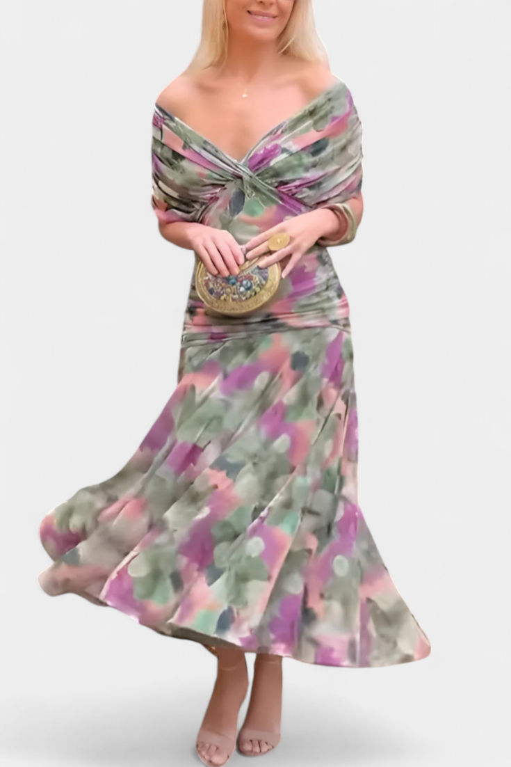 Green and purple ruched off-shoulder maxi dress with sheer sleeves.
