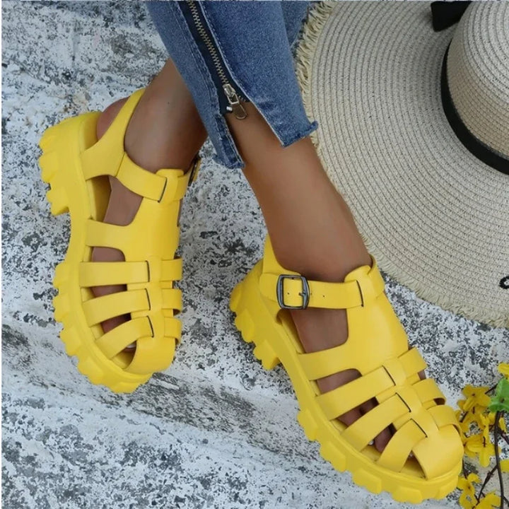 Yellow Mira women's platform fisherman sandals with buckle strap.