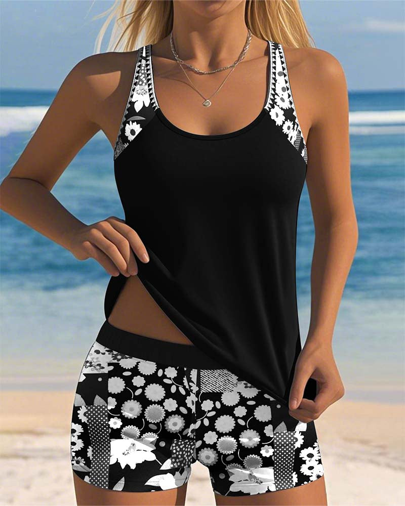 Black women's floral print tankini with shorts, size S, made from quick-dry stretch fabric.