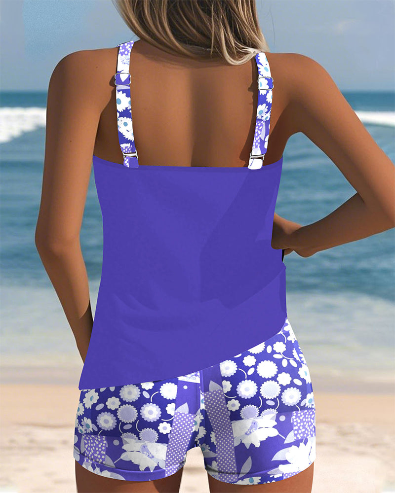 Mirelle women's floral print tankini with black shorts, a stylish and comfortable two-piece swimsuit.