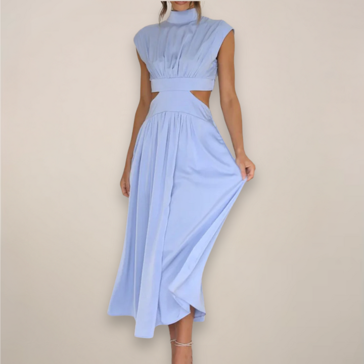 Light blue cutout waist maxi dress with cap sleeves, made from a flowing fabric.
