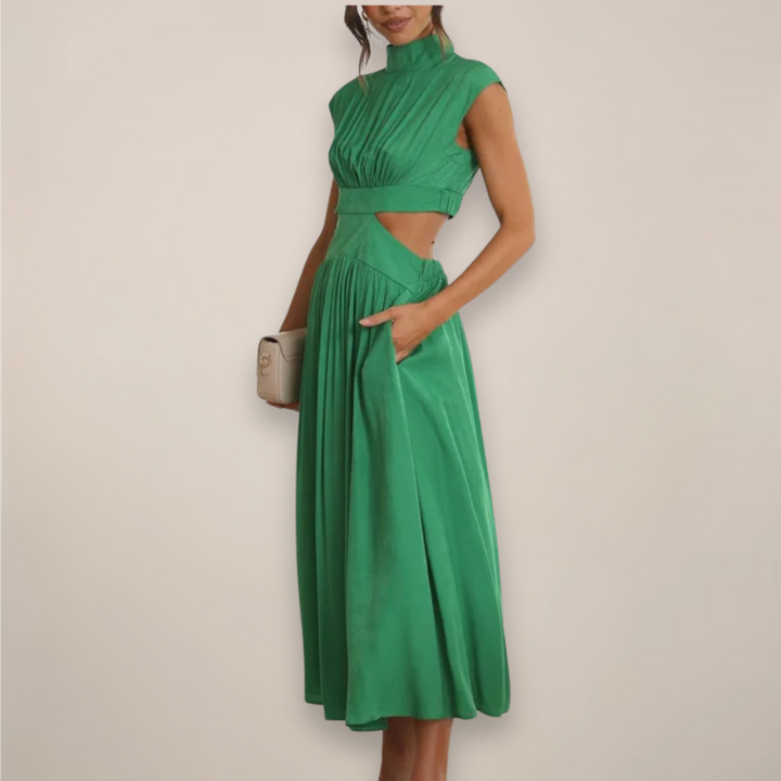 Green cutout waist maxi dress with cap sleeves.