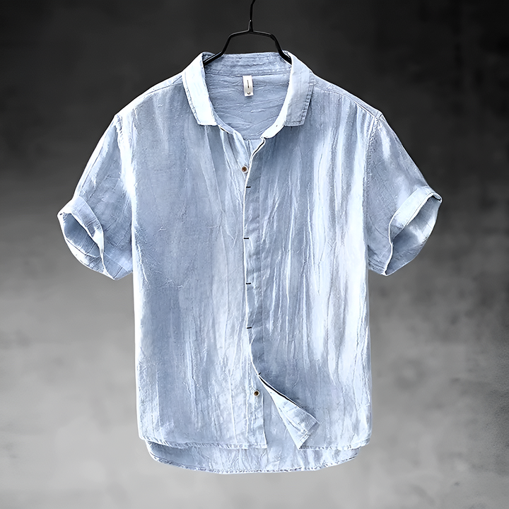 Paulino men's light blue short sleeve button-up shirt with a textured appearance and collared neckline.