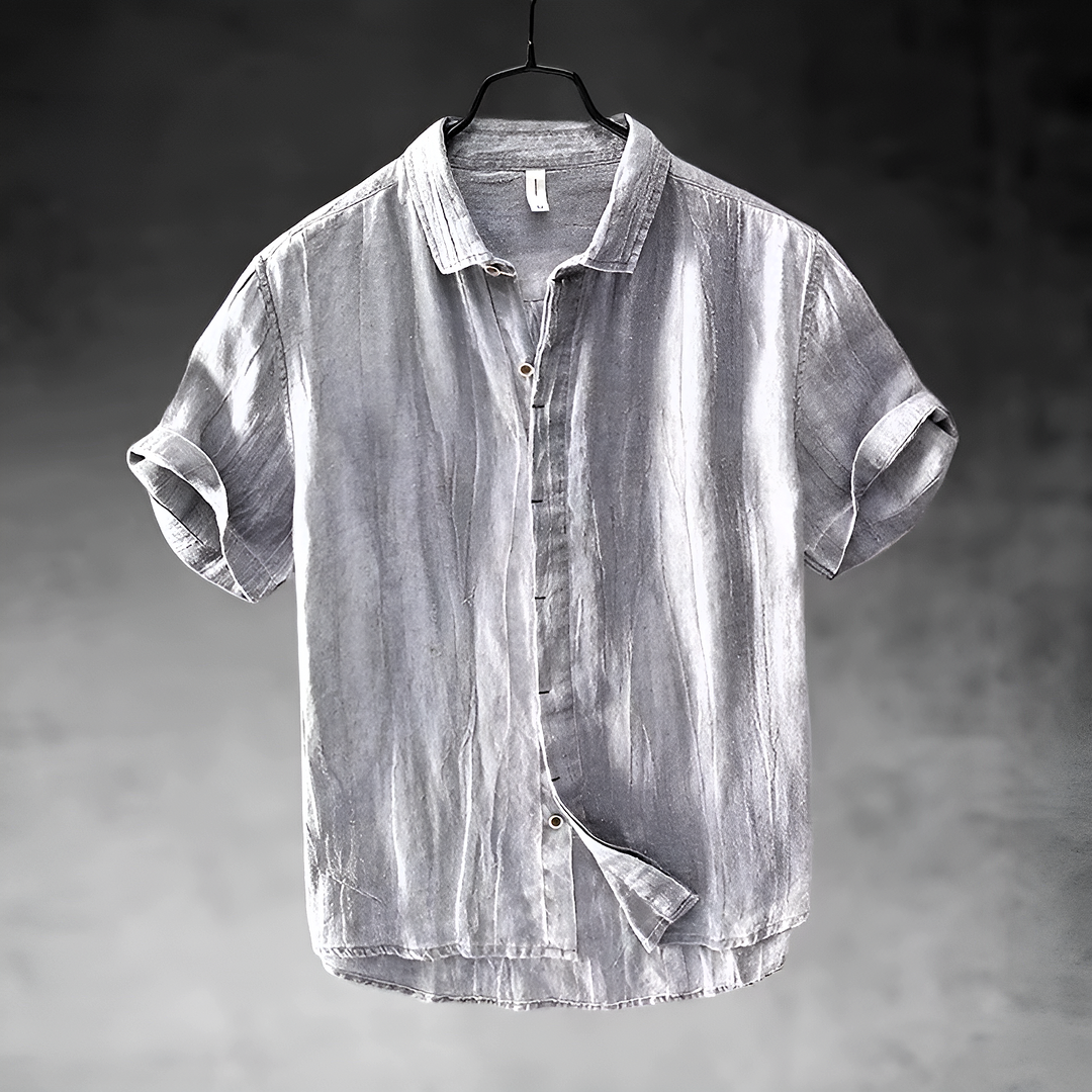 Men's Paulino light gray short sleeve button-up shirt with a textured appearance and collared neckline.