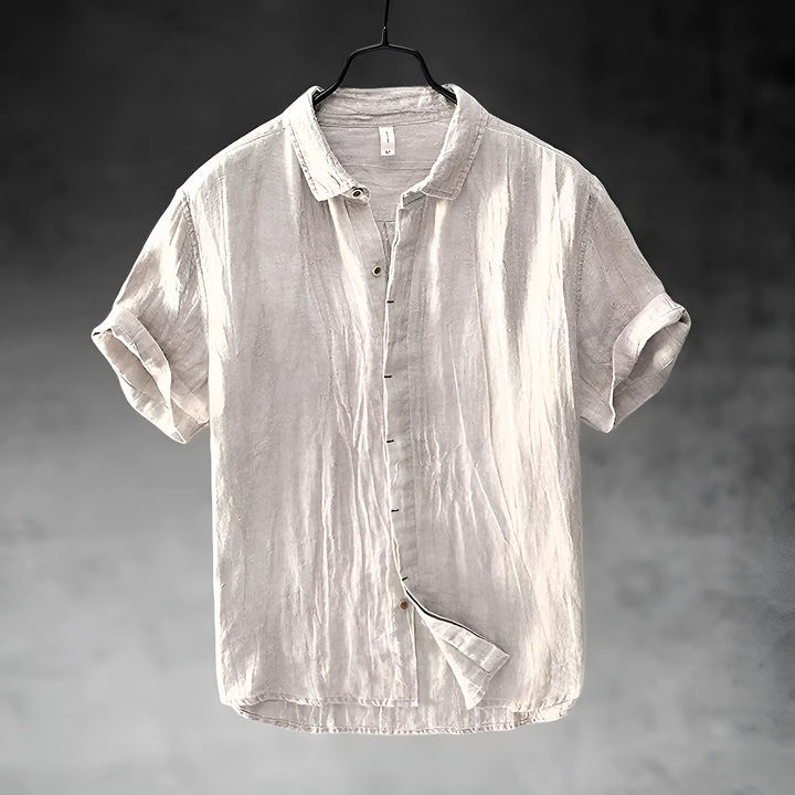 Paulino men's light gray short sleeve button-up shirt with a textured appearance, hanging.