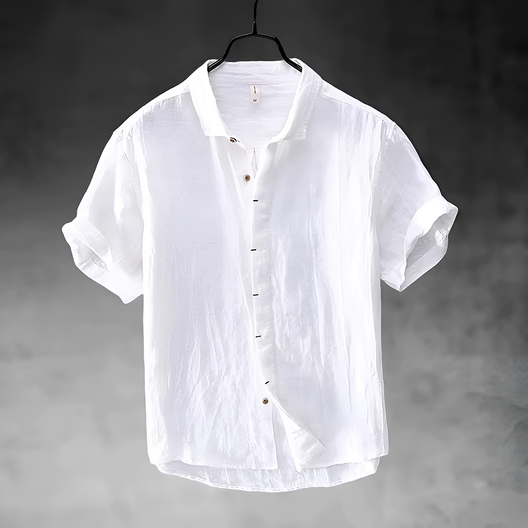 Paulino men's white short sleeve button-up shirt with a collared neckline and textured fabric.