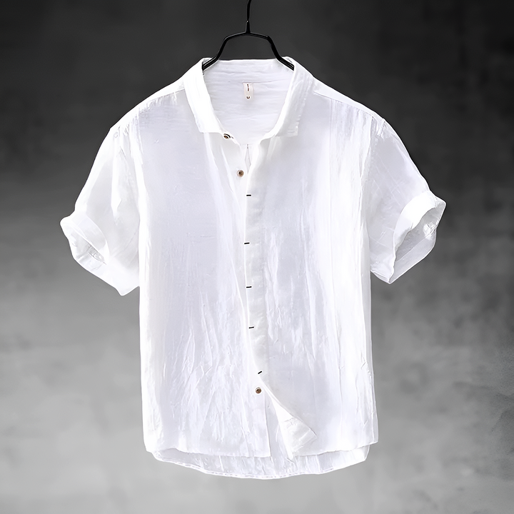 Paulino men's white short sleeve button-up shirt with a collared neckline and textured fabric.