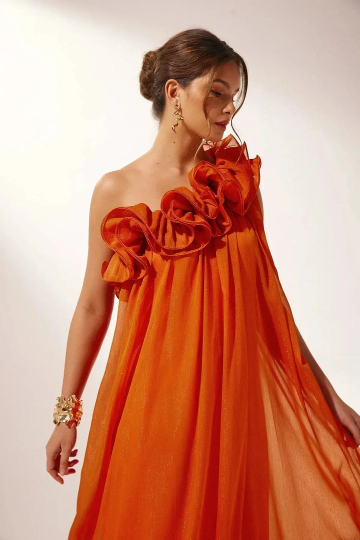 White one-shoulder ruffle maxi dress for women, featuring a flowing skirt and elegant design.