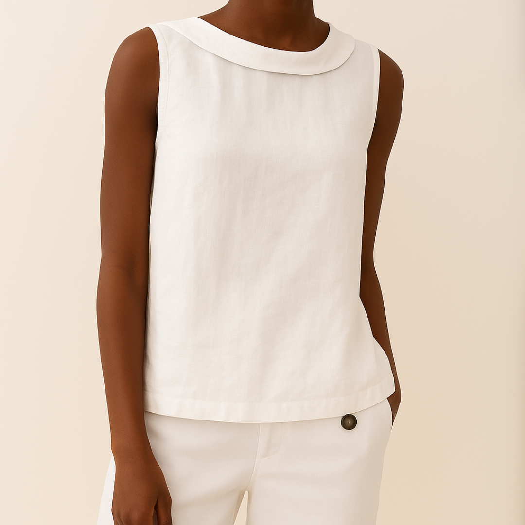 White women's sleeveless roll collar top with a relaxed fit, made from a soft, flowing fabric.