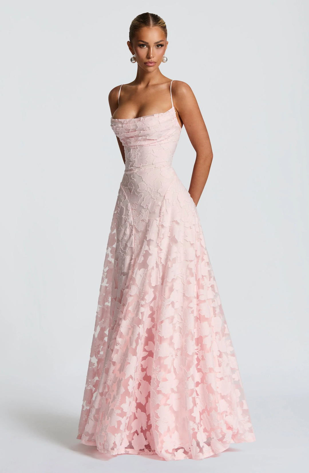 Women's floral spaghetti strap A-line maxi dress in a vibrant print, perfect for summer.