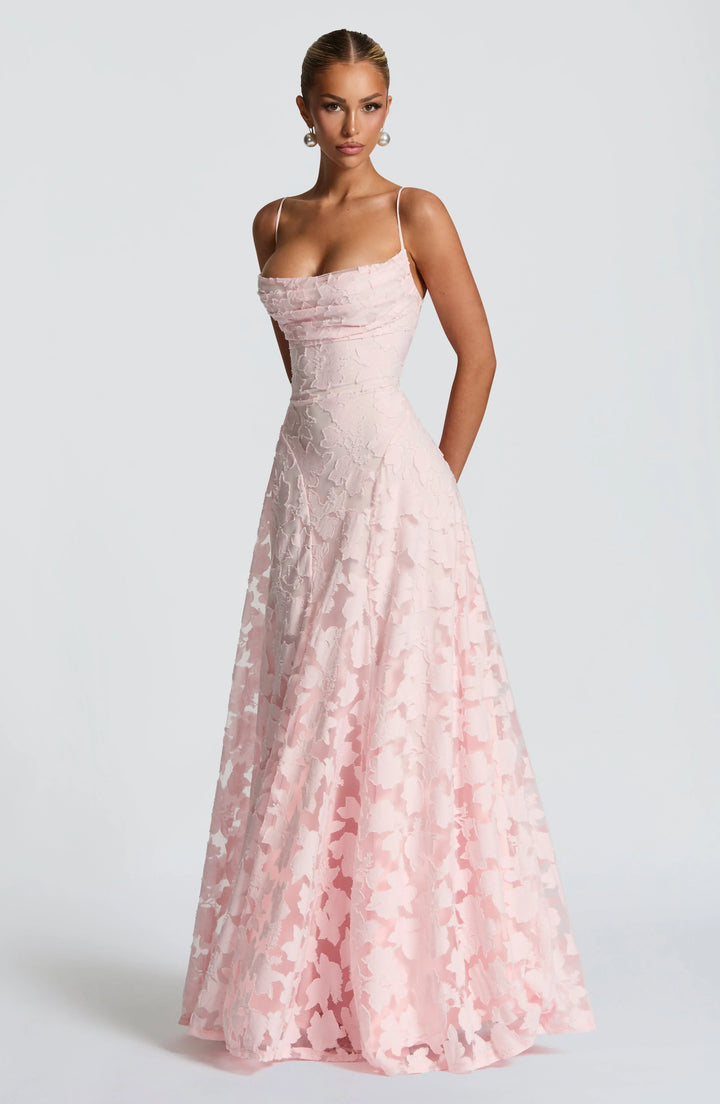 Women's floral spaghetti strap A-line maxi dress in a vibrant print, perfect for summer.